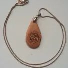 Hand carved maple pendant with pyrography Leeds