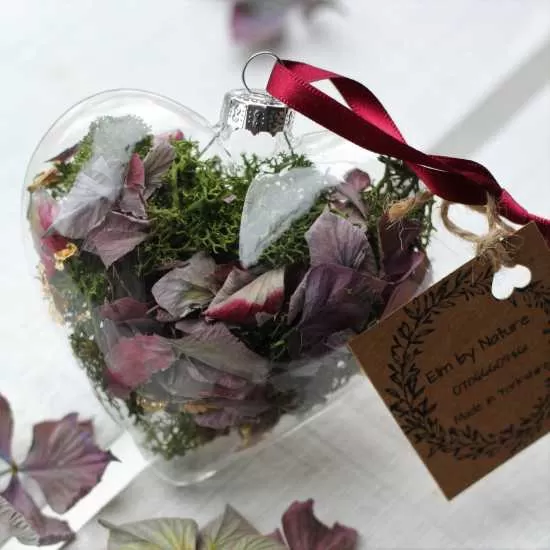  Glass bauble filled with dried flowers