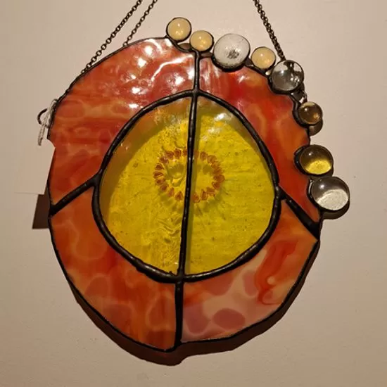 Orange with drops of juice stained glass panel