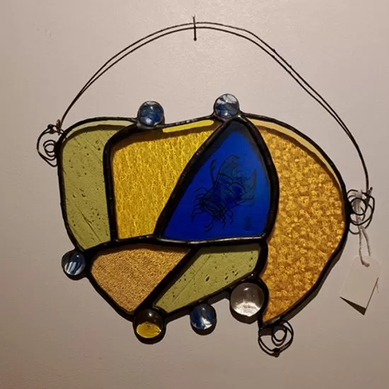 The Bug stained glass panel